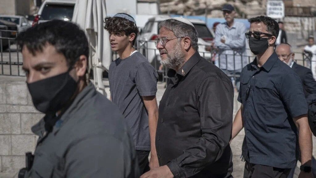 Israel's National Security Minister Itamar Ben Gvir (C) storms Al-Aqsa Mosque in occupied East Jerusalem on 23 July 2026 (Ilia Yefimovich/AFP)